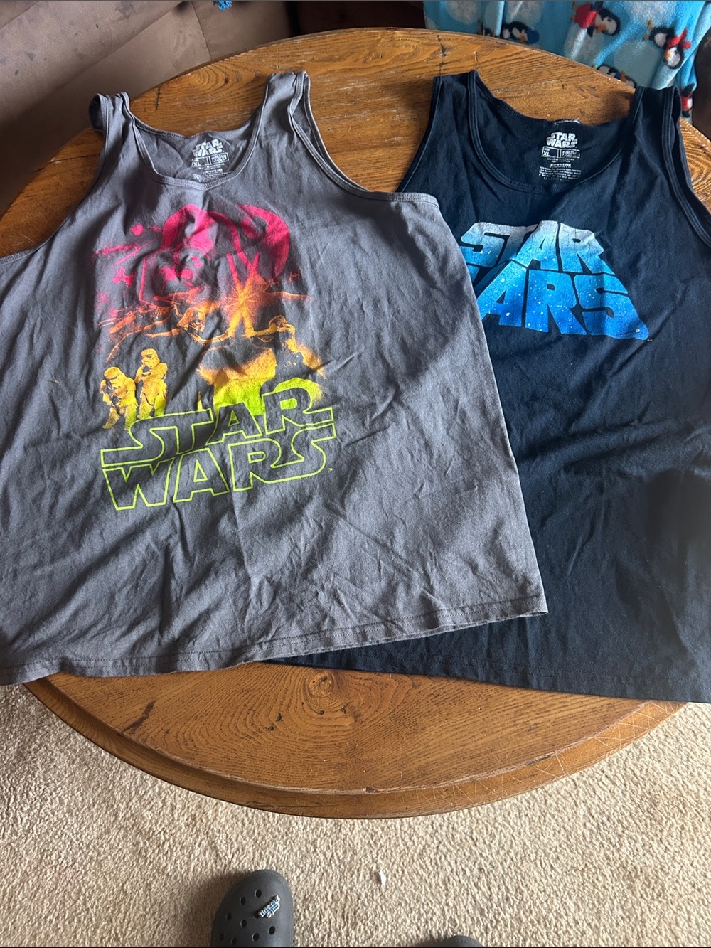 Two Star Wars tank shirts